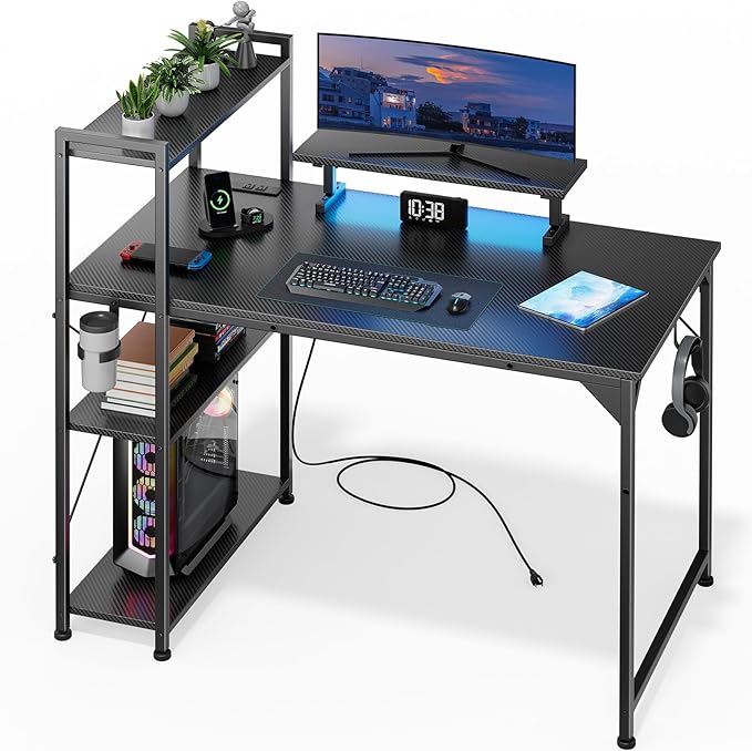 47 Inch Gaming Desk with LED Light, Computer Desk with Reversible Storage Shelves and Power Outlets for Home Office, Black
